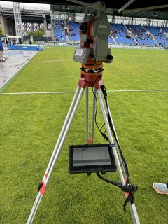 Electronic distance measurement setup at a track and field meet